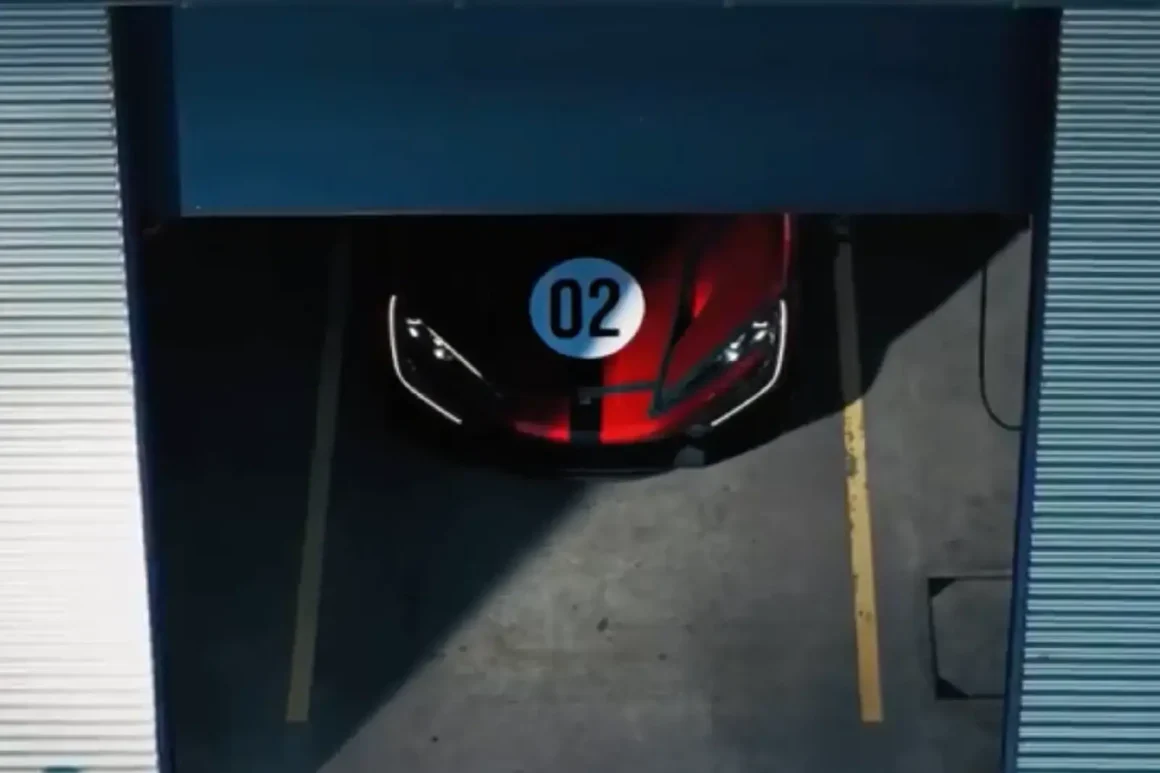 Yangwang U9 Extreme de BYD-sortie de garage-vue de haut-on apercoit le capot avec le 02